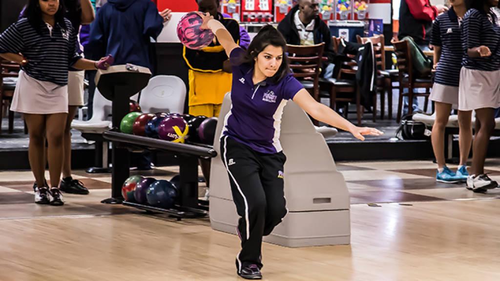 Action shot of Lynsie rolling bowling ball during a SWAC tournament in 2015